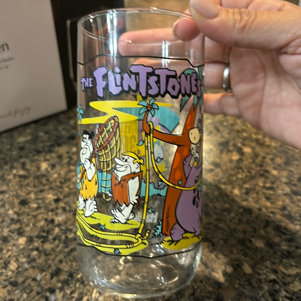 Full set of 4 vintage Flintstones commemorative drink ware.